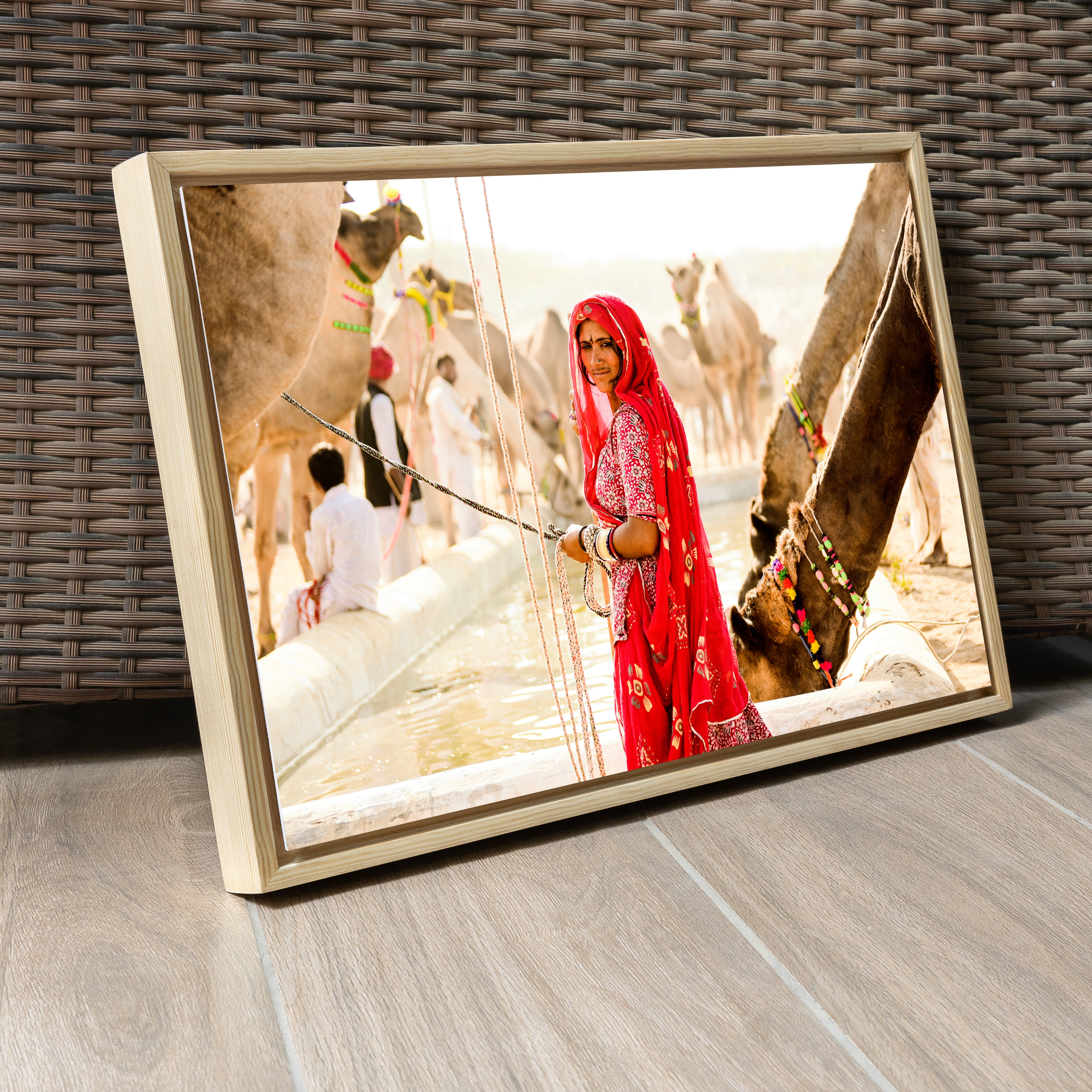 Pushkar Camel Fair – Woman in Red at the Camel Pond | Rajasthan Fine Art Wall Photography Print