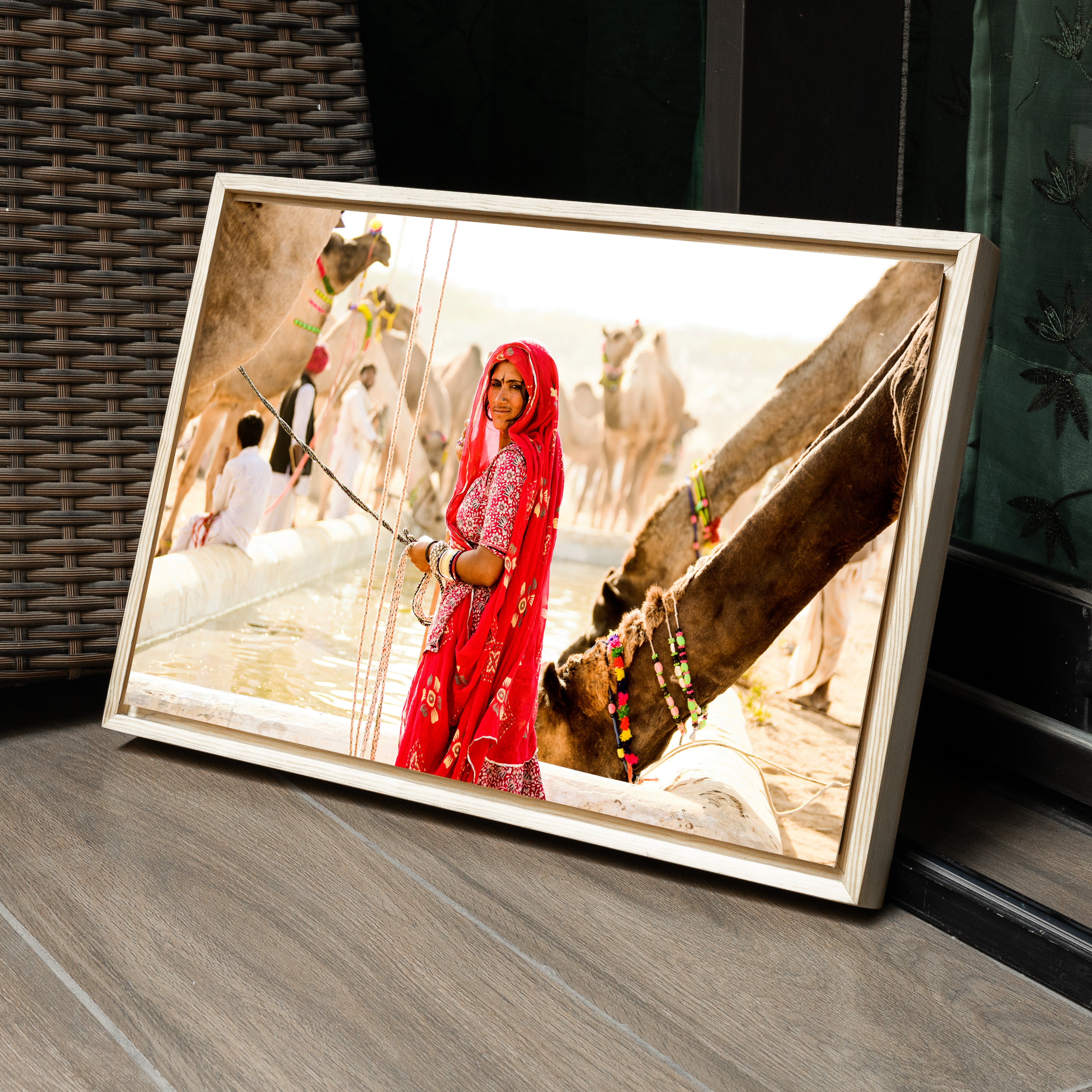 Pushkar Camel Fair – Woman in Red at the Camel Pond | Rajasthan Fine Art Wall Photography Print