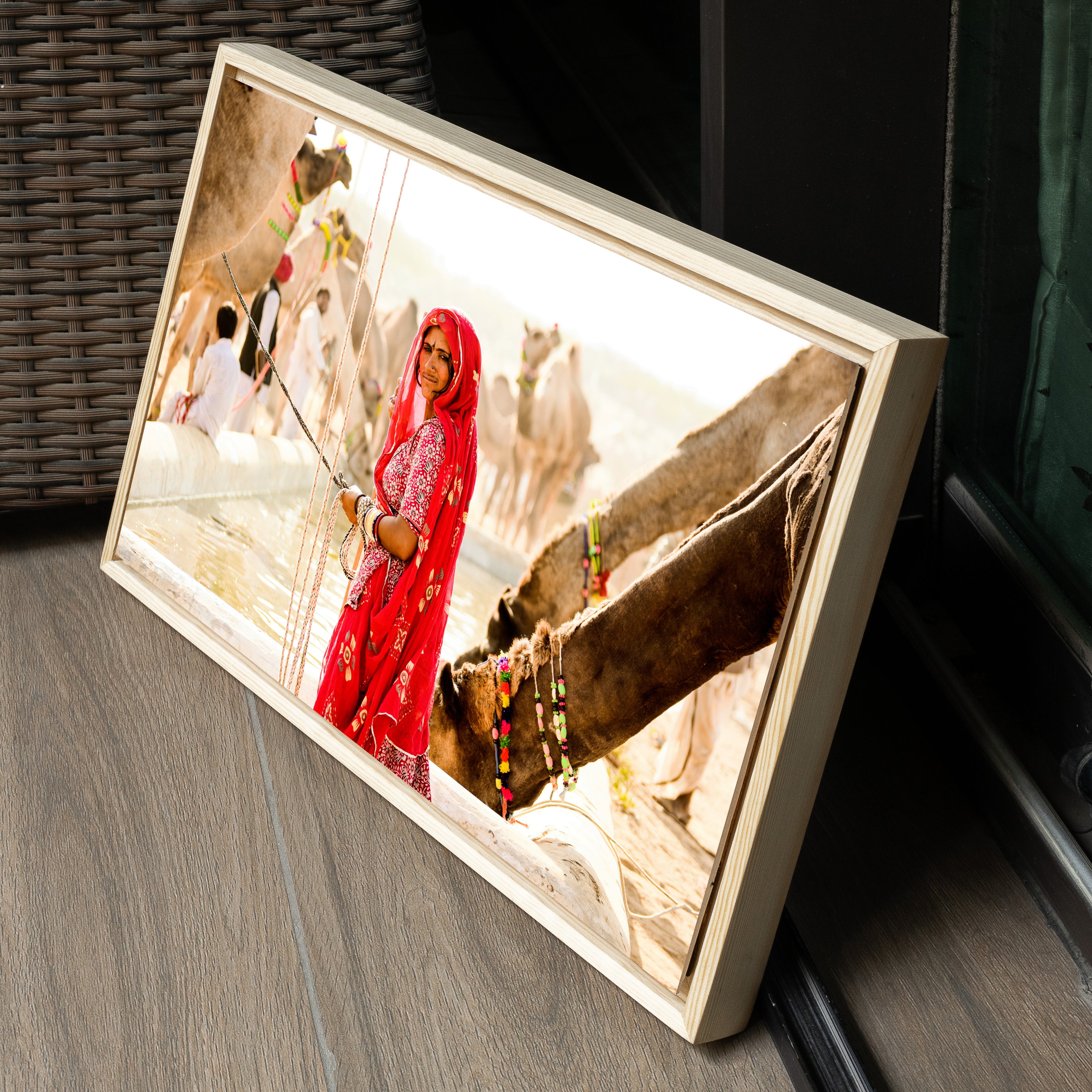 Pushkar Camel Fair – Woman in Red at the Camel Pond | Rajasthan Fine Art Wall Photography Print